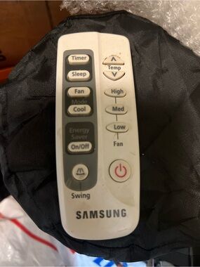 Samsung White Air Conditioner Remote with Gray Button Panel